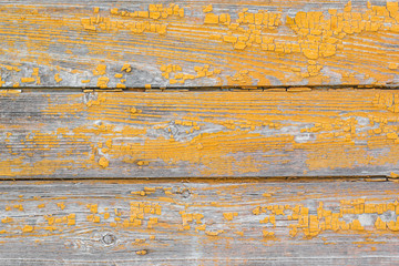 A wooden texture with scratches and cracks.