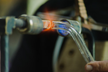 Glass-blowing workshop. Burner. Production of neon tubes