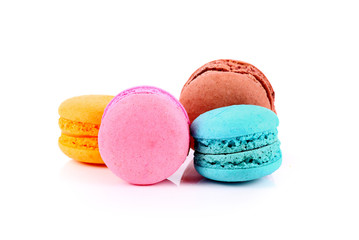 French colorful macarons isolated on white