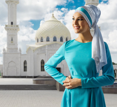 Muslim girl on mosque background