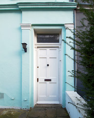 London, vintage house light blue front with white door