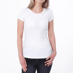 Obraz premium Shirt design and people concept - close up of young woman in blank white tshirt front and rear isolated. Mock up template for design print