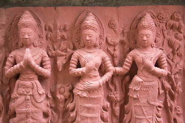 Female stone carvings  at Wat Tai Phra Chao Yai Ong Tue,Ubonratchathani Province,Thailand.