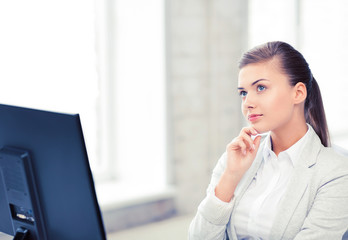 pensive woman in office