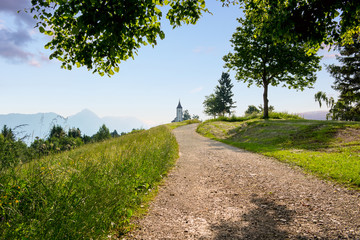Fototapeta na wymiar Jamnik church on a hillside in Slovenia, Europe.