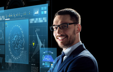 smiling businessman in glasses over black