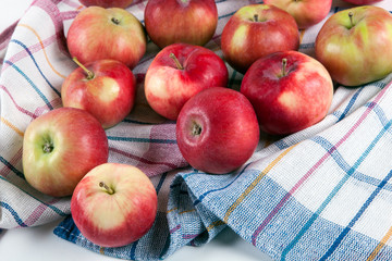 Still life of many apples on a napkin
