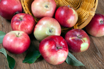 Still life of many apples on a wooden table