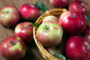 Still life of many apples on a napkin in the basket