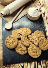 Biscuit sweet cookie background. Domestic stacked butter biscuit pattern concept,close up macro.Homemade cookies on wooden table.Cereal biscuits with the sesame,peanuts,sunflower and amaranth.
