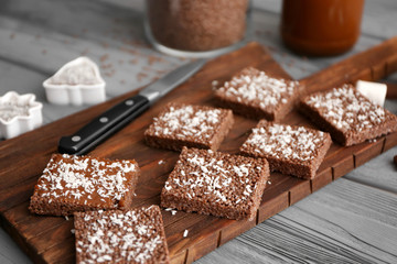 Rice crispy treats on wooden board