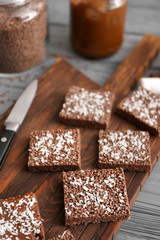 Rice crispy treats on wooden board