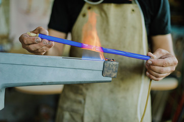 Glass-blowing workshop. Burner. Production of neon tubes