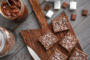 Rice crispy treats on wooden board