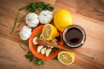 Organic vegetables antioxidant diet with garlic lemon honey and leaves of parsley 