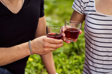 picnic on the grass. juice,fruit,Picnic at the park on the grass,healthy food and accessories,Picnic Grass Summer Time Rest,loving couple  on a picnic