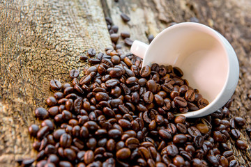 Coffee. Coffee beans. Coffee cup full of coffee beans.