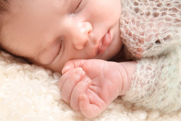 Sleeping newborn baby boy, closeup