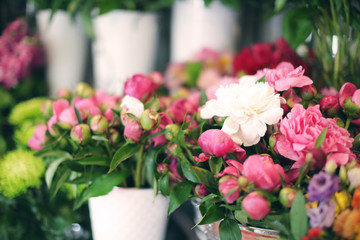 Beautiful peonies in flower shop