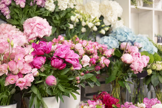 Fototapeta Beautiful peonies and other flowers in shop