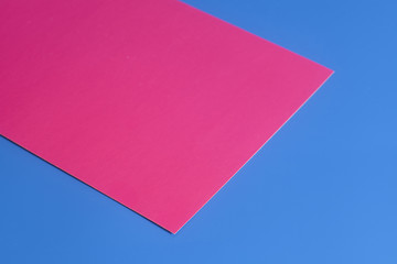 Purple paper sheet on blue background