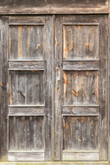 Vintage rustic weathered wooden door texture