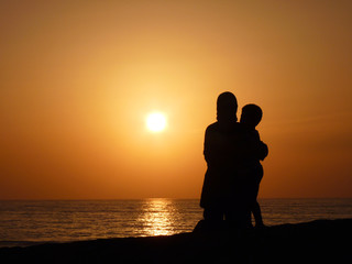 hug in sunset