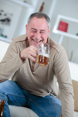 man holding a pint