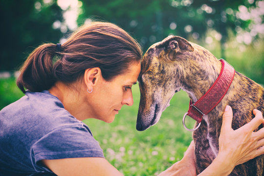 Friendship between woman and her dog. 