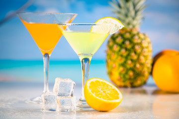 Colorful summer background with drink and palms