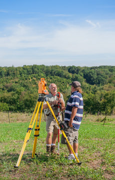 Survey Crew with Tripod and EDM