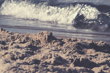 Obraz premium Sea landscape with beach. Sand on the beach. Colorful light. Nature landscape. Baltic Sea