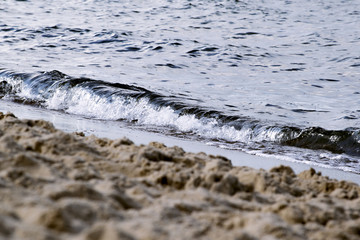 Sea landscape with beach. Sand on the beach. Colorful light. Nature landscape. Baltic Sea