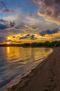 Pewaukee Lake Beach at Sunset After Storm