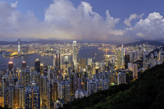 China, Hong Kong, Victoria Peak. View over Hong Kong from Victoria Peak. The illuminated skyline of Central sits below The Peak