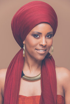 beautiful african woman wearing a traditional headwrap 