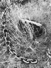 Chains and a rock monochrome black and white 