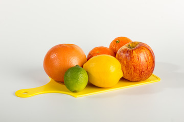 Various Fruit on Cutting Board