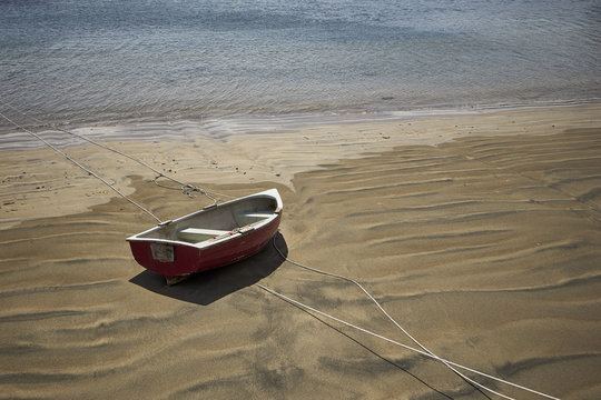 Dinghy On New Zealand Beach