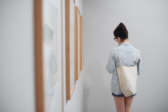 Girl browsing in Art Gallery