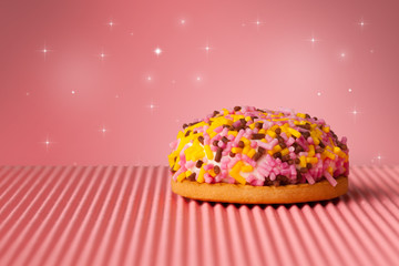 Close up of a delicious colorful baked cake with star background