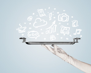 Waiter holding tray with media icons