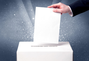 Ballot box with person casting vote