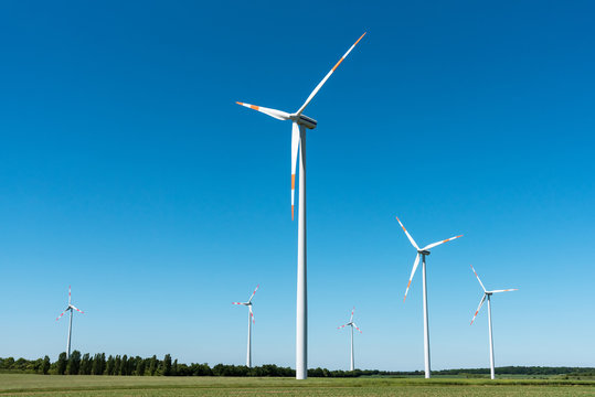 Windwheels in front of a blue sky in Germany