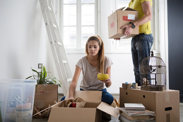 Couple Unpacking After Moving In