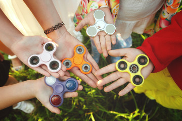 Two fidget spinners