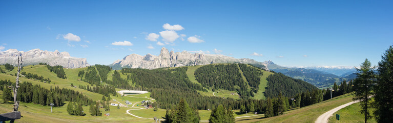 Obraz premium Great landscape on the Dolomites. View on Sella group, Boè peak, Gardenaccia massif and Sassongher summit. Alta Badia, Sud Tirol, Italy