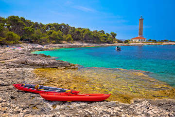 Veli Rat lighthouse and turquoise beach view - obrazy, fototapety, plakaty