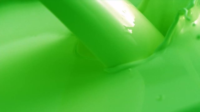 Pouring Deep Green  paint.