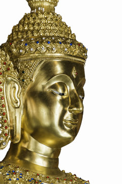 Head of golden Buddha Image on white background